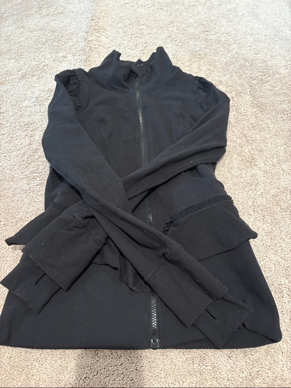 Black Zip-Up Jacket with Ruffle Details